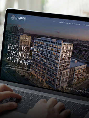 laptop screen showing website design for real estate project advisors