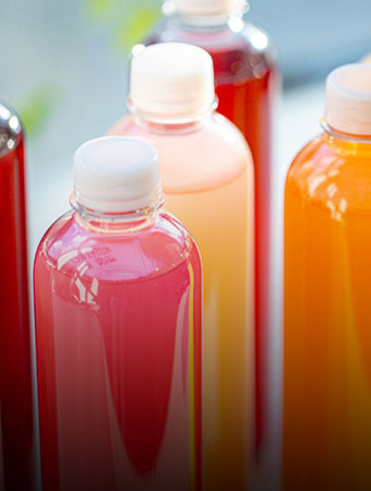 colorful bottles for Natural Food Color Company Sensient Food Colors